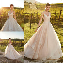 Load image into Gallery viewer, Spaghetti Straps And Tiered Ruffles Flowing Sweep Train Are The Feature Of This Beautiful Dress - A Thrifty Bride Shop