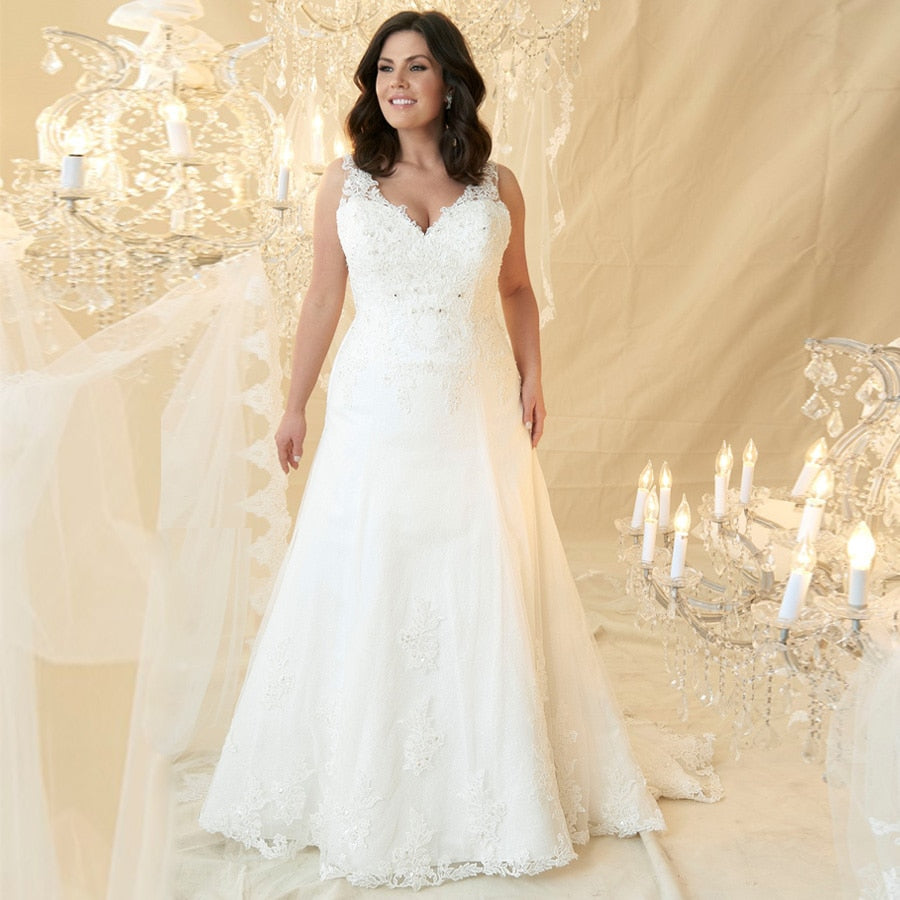 Sexy Plus Size Deep V Neck With Beading And Applique Lace Bridal Gown Has Sweep Train