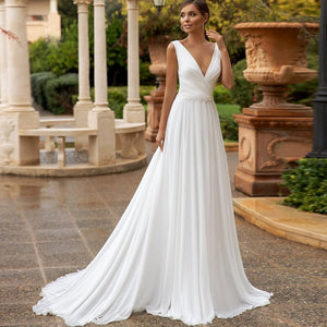 Elegant Flowing Double V-Neck Beach Wedding Dress Beaded Made With Chiffon Bride Features Sweep