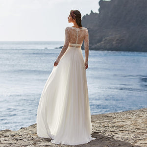 Bohemian Wedding Dress Made In Chiffon Featuring Long Sleeves Low Cut V-Neck A-Line Bodice And Lace Back