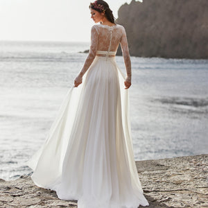 Bohemian Wedding Dress Made In Chiffon Featuring Long Sleeves Low Cut V-Neck A-Line Bodice And Lace Back