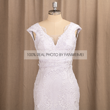 Load image into Gallery viewer, Wedding Dress Features Deep V-Neck Sexy Backless With Cap Sleeves Made In Lace Sheath Boho Style