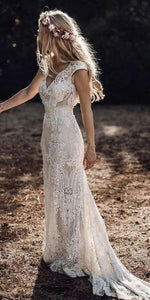 Wedding Dress Features Deep V-Neck Sexy Backless With Cap Sleeves Made In Lace Sheath Boho Style
